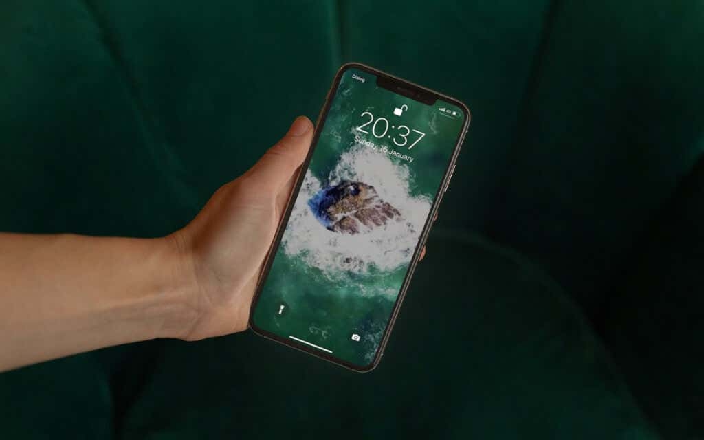An iPhone with Live Photo wallpaper